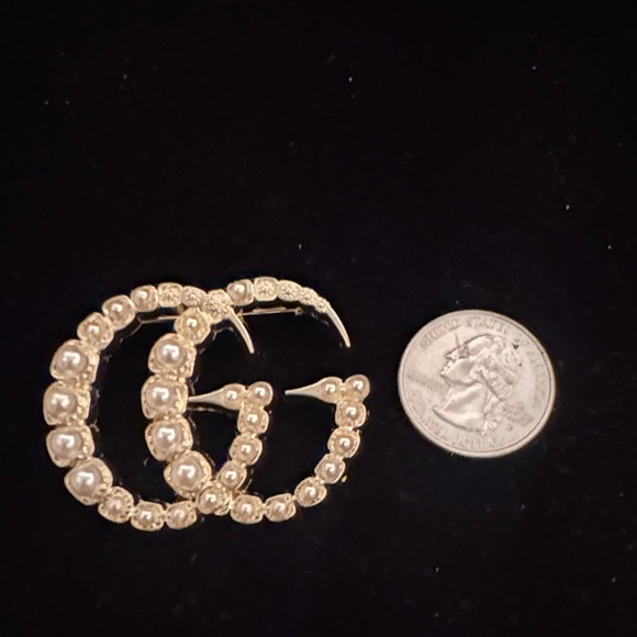 Brooch /pin signed in back Gucci